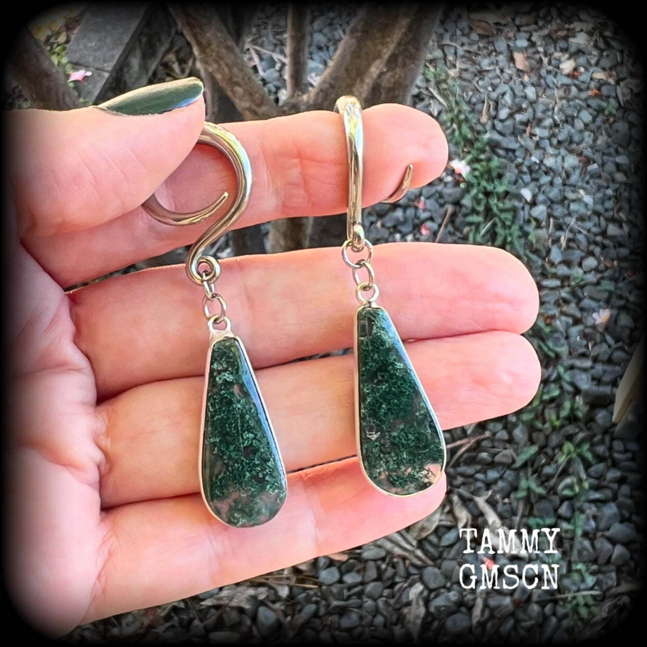 🔥 Moss agate is known to attract prosperity, balance emotions, and boost physical health and fertility 🔥

These unique gauged earrings feature gorgeous green moss agate teardrop gemstones, measure just over 6cms from tip to tip, and weigh approx 6 grams each.

This pair have been made with 6 gauge (4mm) surgical steel full curls, suitable for stretched lobes.