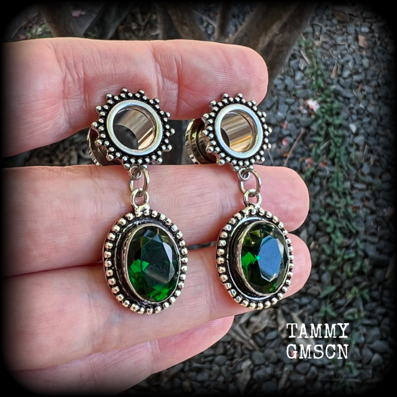 💚 Green quartz is associated with the heart chakra and is thought to awaken love, empathy, compassion.

These gorgeous earrings have been made with beautiful deep green faceted quartz gemstones in antique silver settings, beautifully light weight, weighing approx 7 grams each and measure 4.5 cms from tip to tip.

This pair has been made with 00 gauge (10mm) surgical steel screw fit ornate tunnels.