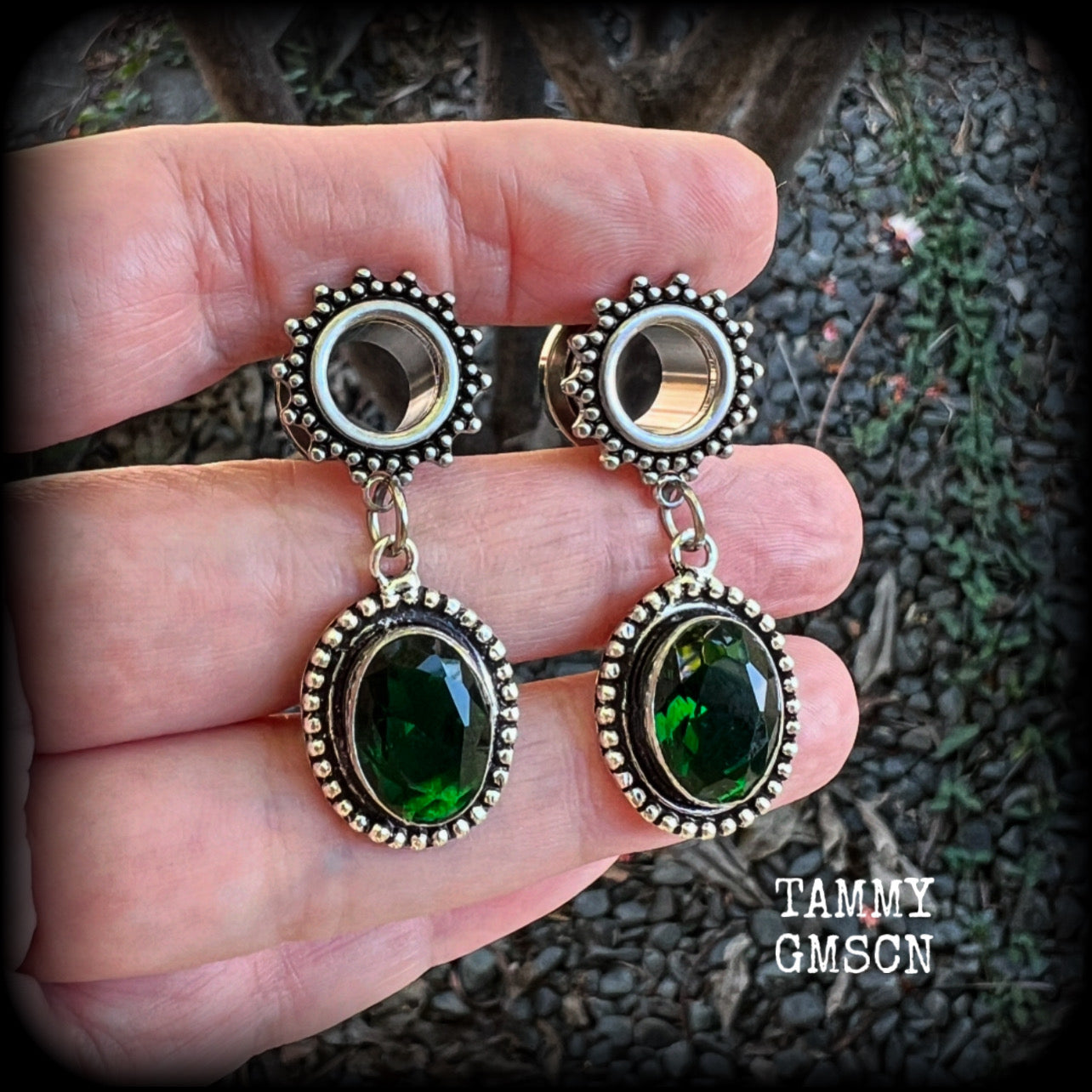 💚 Green quartz is associated with the heart chakra and is thought to awaken love, empathy, compassion.

These gorgeous earrings have been made with beautiful deep green faceted quartz gemstones in antique silver settings, beautifully light weight, weighing approx 7 grams each and measure 4.5 cms from tip to tip.

This pair has been made with 00 gauge (10mm) surgical steel screw fit ornate tunnels.