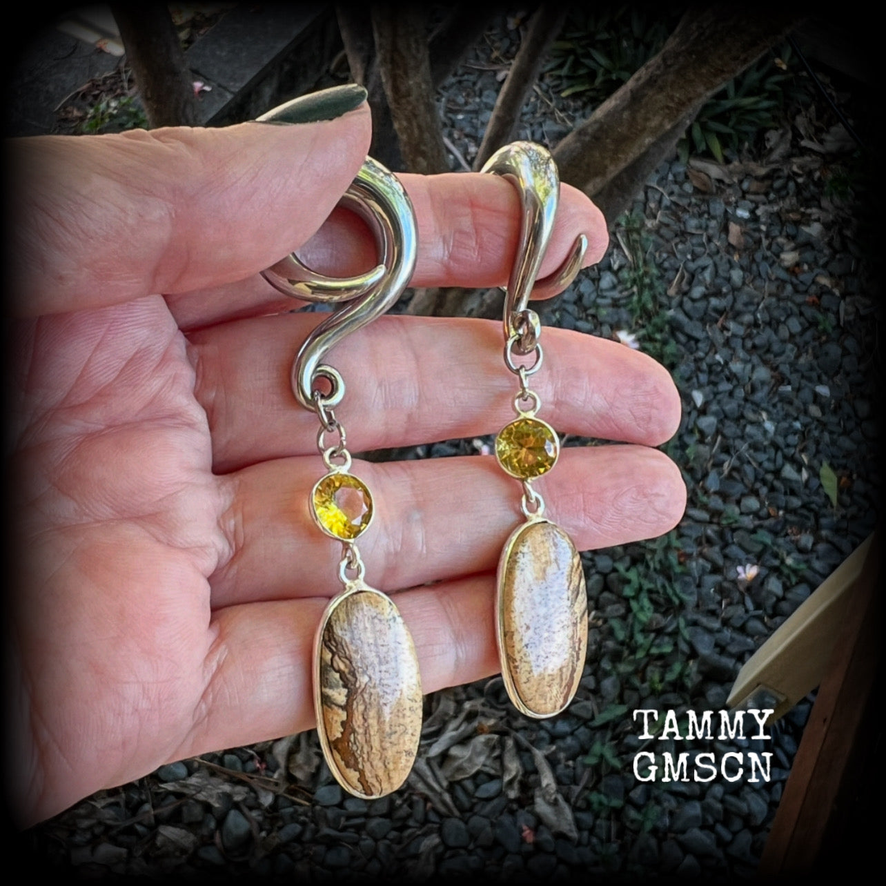 🔥 Picture jasper is used to connect to the Earth's energy, promote emotional balance, and inspire visualization in meditation.

Featuring beautiful picture jasper gems hanging from golden yellow citrine gemstones, these earrings measure just over 8cms from tip to tip, and weigh approx 17 grams each.

This pair have been made on 0 gauge (8mm) surgical steel full curl hooks, suitable for stretched lobes.
