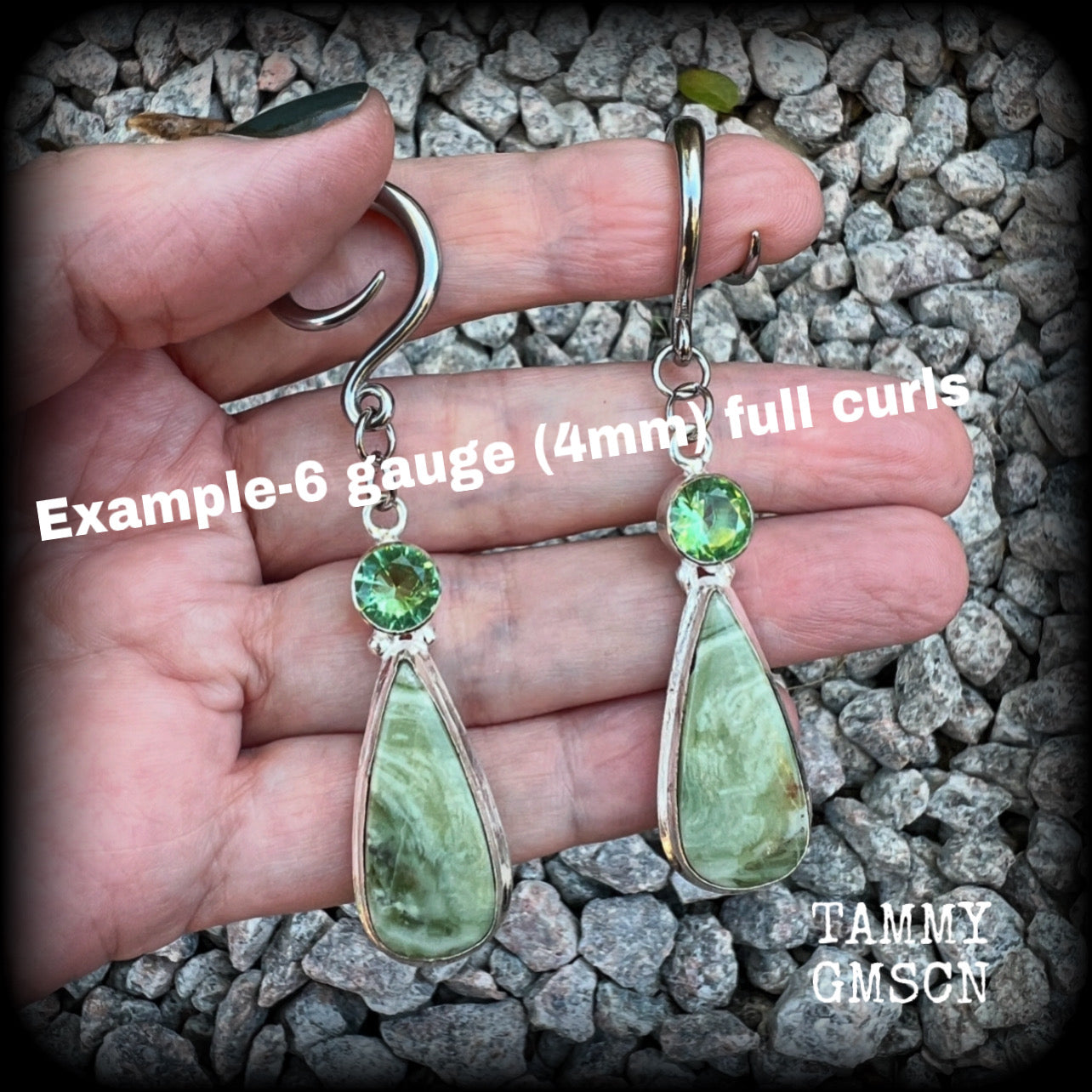 These beautiful Serpentine and green garnet earrings are made with gorgeous polished and faceted gemstones, lovely and dangly measuring just approx 7.5cms from tip to tip, and weighing approx 9 grams each.   These earrings have been made on 6 gauge (4mm) surgical steel full curl hooks, to be worn in stretched lobes.