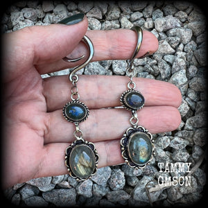 These gorgeous gemstone earrings feature beautiful polished labradorite gemstones in a gorgeous boho antique silver setting. Lovely and dangly, these earrings measure 7.5cms from tip to tip, and weigh approx 10 grams each.  This pair have been made with 6 gauge (4mm) surgical steel full curl hooks, suitable for stretched lobes.