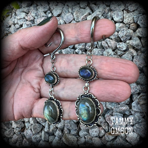 These gorgeous gemstone earrings feature beautiful polished labradorite gemstones in a gorgeous boho antique silver setting. Lovely and dangly, these earrings measure 7.5cms from tip to tip, and weigh approx 10 grams each.  This pair have been made with 6 gauge (4mm) surgical steel full curl hooks, suitable for stretched lobes.