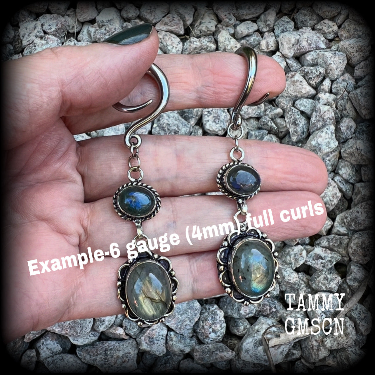 These gorgeous gemstone earrings feature beautiful polished labradorite gemstones in a gorgeous boho antique silver setting. Lovely and dangly, these earrings measure 7.5cms from tip to tip, and weigh approx 10 grams each.  This pair have been made with 6 gauge (4mm) surgical steel full curl hooks, suitable for stretched lobes.