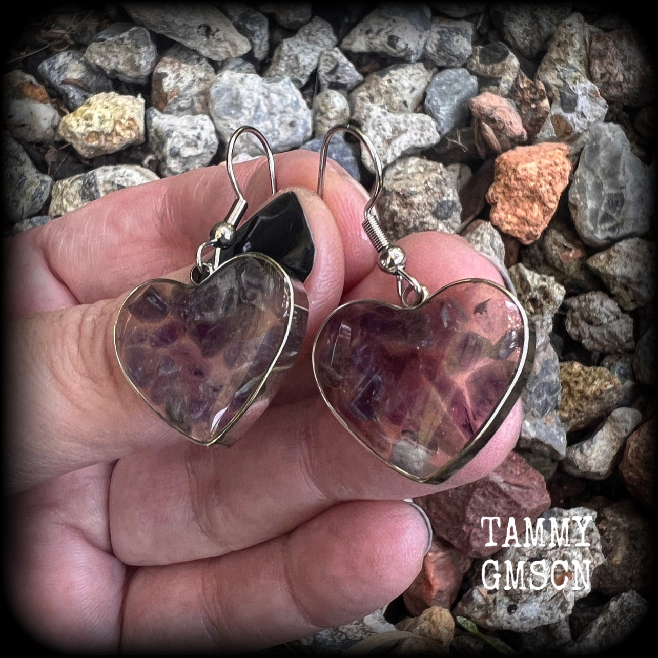 These beautiful gemstone earrings feature gorgeous amethyst gemstone chips set in a resin heart, are nice and lightweight at only 3 grams each and measure just on 4cms from tip to tip.

This pair have been made with stainless steel french hooks, for pierced ears.