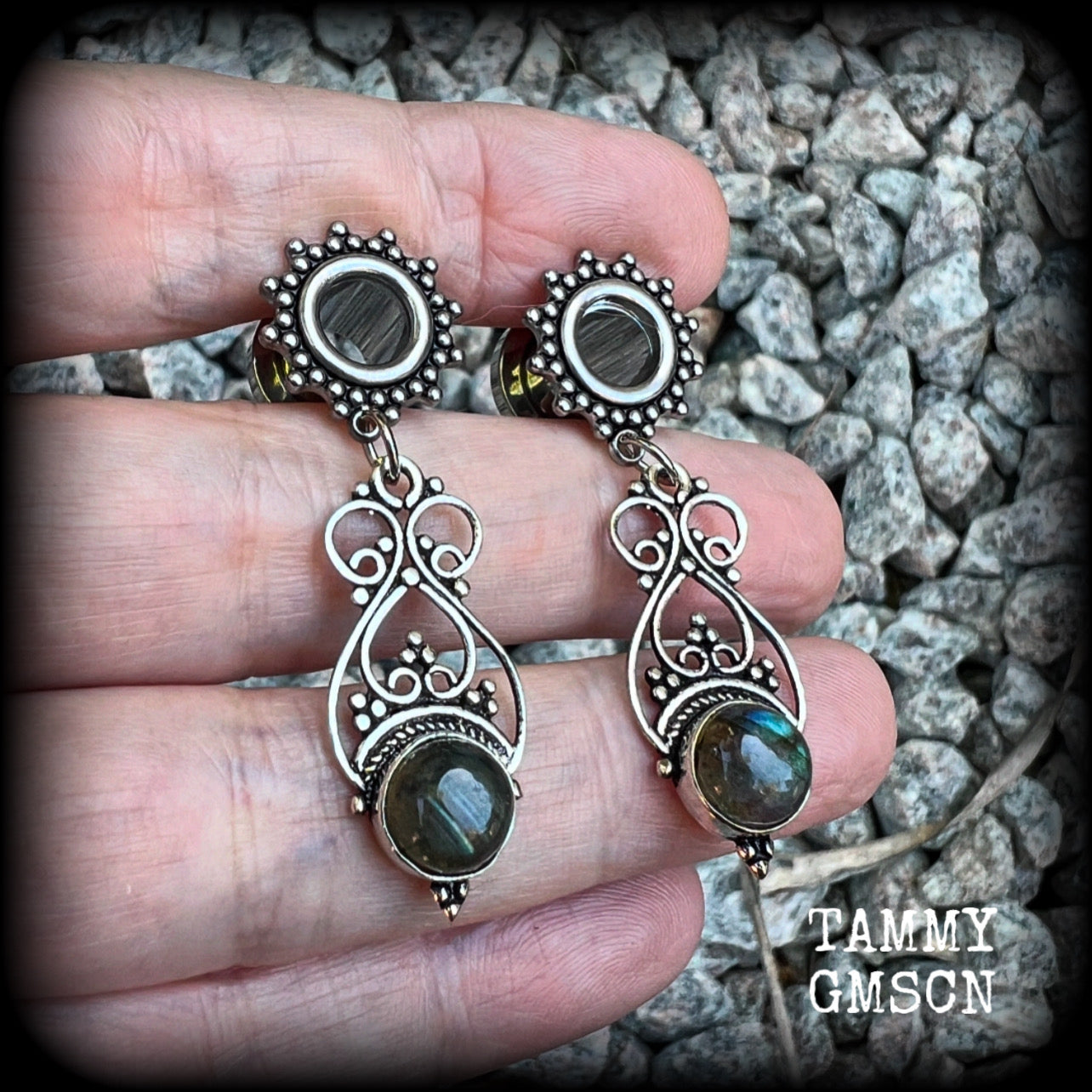 These gorgeous tunnel earrings have been made with beautiful labradorite gemstones in a boho antique silver setting, weighing approx 5 grams each and measure just under 5cms from tip to tip.  This pair has been made with 0 gauge (8mm) surgical steel ornate tunnels-suitable for stretched lobes.