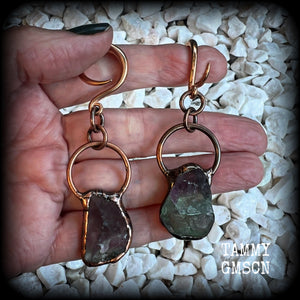 Featuring gorgeous unique fluorite gemstones in an antique copper setting, these gauged earrings measure approx 7.5cms from tip to tip, and weigh approx 15 grams each.

This pair has been made on 6 gauge (4mm) rose gold tone surgical steel full curl hooks, suitable for stretched lobes.