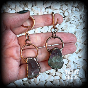 Featuring gorgeous unique fluorite gemstones in an antique copper setting, these gauged earrings measure approx 7.5cms from tip to tip, and weigh approx 15 grams each.

This pair has been made on 6 gauge (4mm) rose gold tone surgical steel full curl hooks, suitable for stretched lobes.