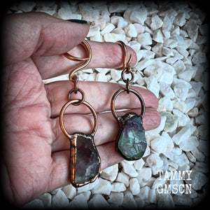 Featuring gorgeous unique fluorite gemstones in an antique copper setting, these gauged earrings measure approx 7.5cms from tip to tip, and weigh approx 15 grams each.

This pair has been made on 6 gauge (4mm) rose gold tone surgical steel full curl hooks, suitable for stretched lobes.