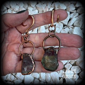 Featuring gorgeous unique fluorite gemstones in an antique copper setting, these gauged earrings measure approx 7.5cms from tip to tip, and weigh approx 15 grams each.

This pair has been made on 6 gauge (4mm) rose gold tone surgical steel full curl hooks, suitable for stretched lobes.
