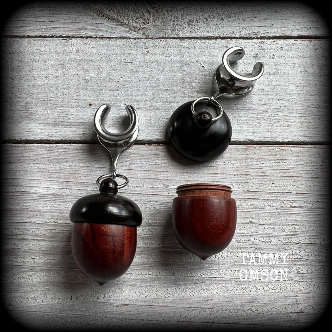 These gorgeous carved red Sandalwood acorn stash pot earrings weigh in at only 7 grams a piece, and measure just on 6cms from tip to tip.

This pair has been made with 1/2” gauge (12mm) surgical steel cradles, suitable for stretched lobes.