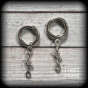 These punk rock boot charms feature antique silver barb wire charms, nice and lightweight, and nice and dangly 6cms from top to bottom.

Made to last, all our boot charms are made with super sturdy Rhodium snap rings and strong jump rings. They wont come off and they will not rust!