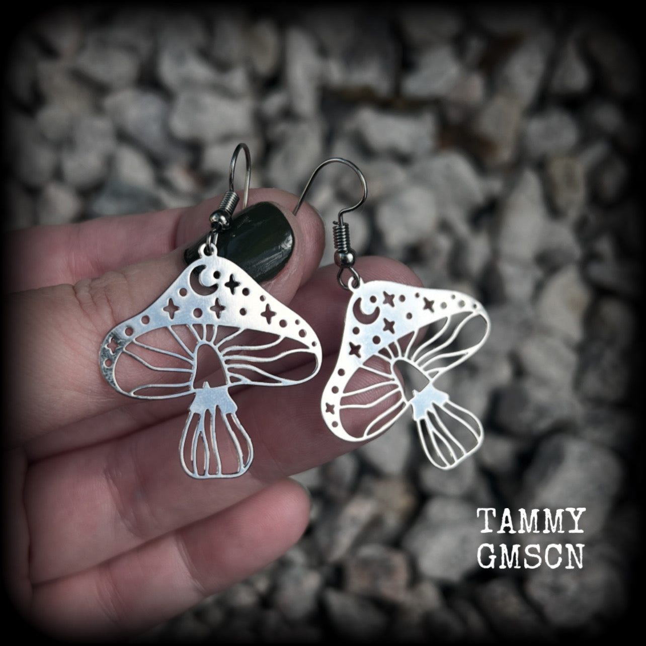 These adorable celestial stainless steel mushroom earrings measure in at just on 5cms from tip to tip, and are nice and light weighing only a few grams each.

This pair has been made with stainless steel french hooks, for pierced ears.