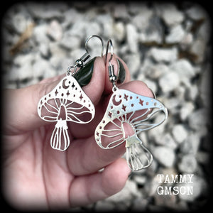 These adorable celestial stainless steel mushroom earrings measure in at just on 5cms from tip to tip, and are nice and light weighing only a few grams each.

This pair has been made with stainless steel french hooks, for pierced ears.