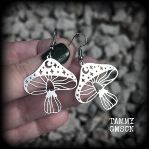 These adorable celestial stainless steel mushroom earrings measure in at just on 5cms from tip to tip, and are nice and light weighing only a few grams each.

This pair has been made with stainless steel french hooks, for pierced ears.