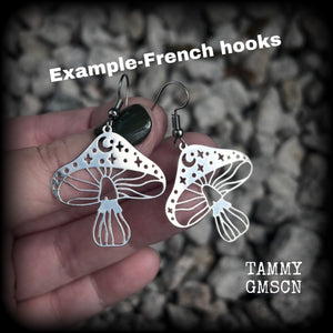 These adorable celestial stainless steel mushroom earrings measure in at just on 5cms from tip to tip, and are nice and light weighing only a few grams each.

This pair has been made with stainless steel french hooks, for pierced ears.