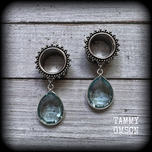 These gorgeous tunnel dangles feature beautiful blue topaz gemstones set in antique silver, weighing approx 16 grams each and measuring just over 5cms from tip to tip.
This pair has been made with 5/8" gauge (16mm) surgical steel ornate tunnels-for stretched lobes.