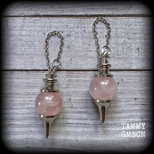 These beautiful gemstone earrings feature dusty pink rose quartz pendulums, nice and dangly, measuring just on 8cms and weighing approx 16 grams a piece.
