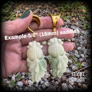 These gorgeous earrings feature carved jade koi fish, weighing approx. 20 grams each and measuring approx 9cms from tip to tip.
This pair have been made on 5/8” gauge (16mm) surgical steel saddles suitable for stretched lobes.