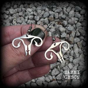 These amazing earrings feature offensive stainless steel female reproductive organs giving the middle finger! Nice and lightweight, weighing only a few grams each, these earrings measure approx 3.5cms from tip to tip.

This pair have been made on stainless steel french hooks, for pierced ears.