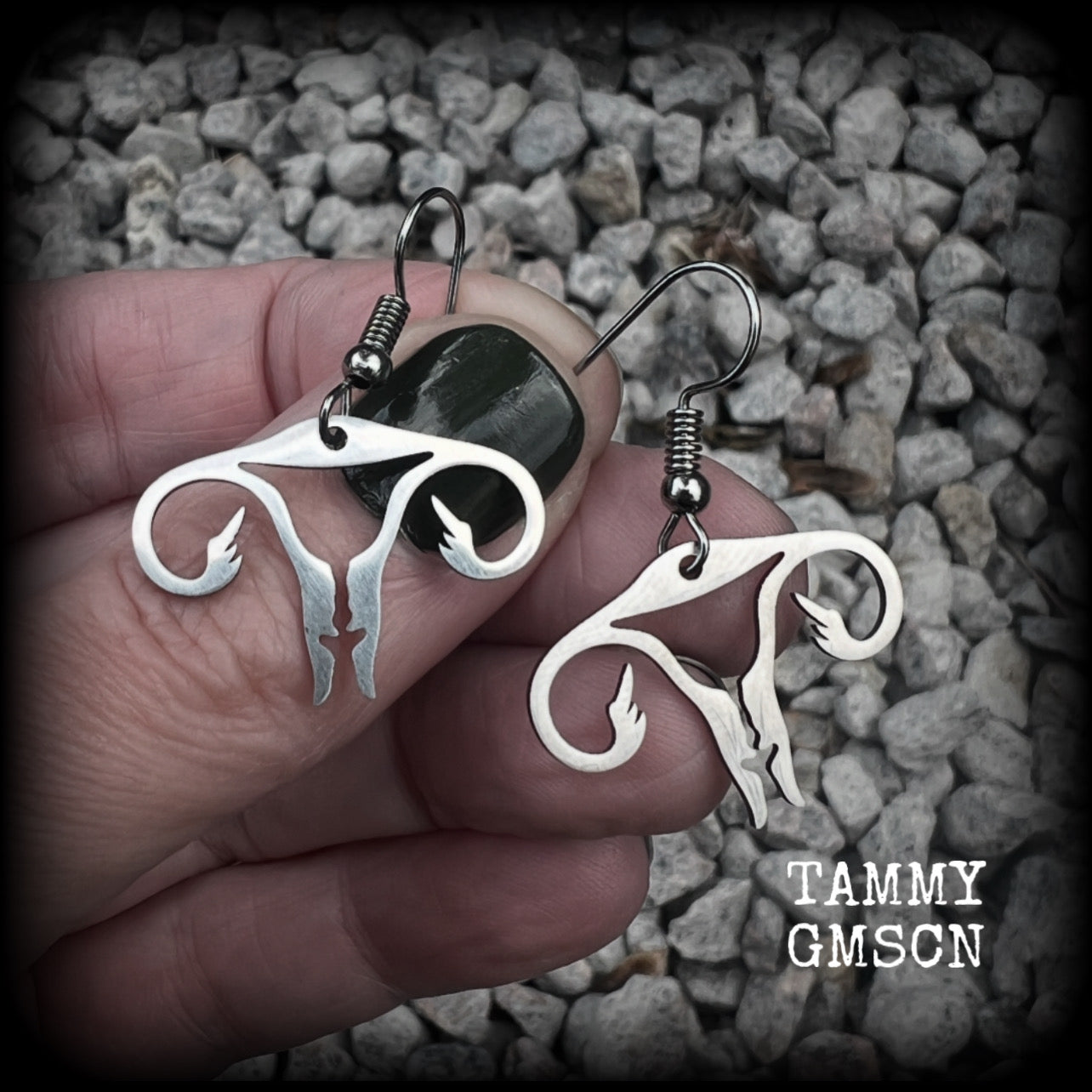 These amazing earrings feature offensive stainless steel female reproductive organs giving the middle finger! Nice and lightweight, weighing only a few grams each, these earrings measure approx 3.5cms from tip to tip.

This pair have been made on stainless steel french hooks, for pierced ears.