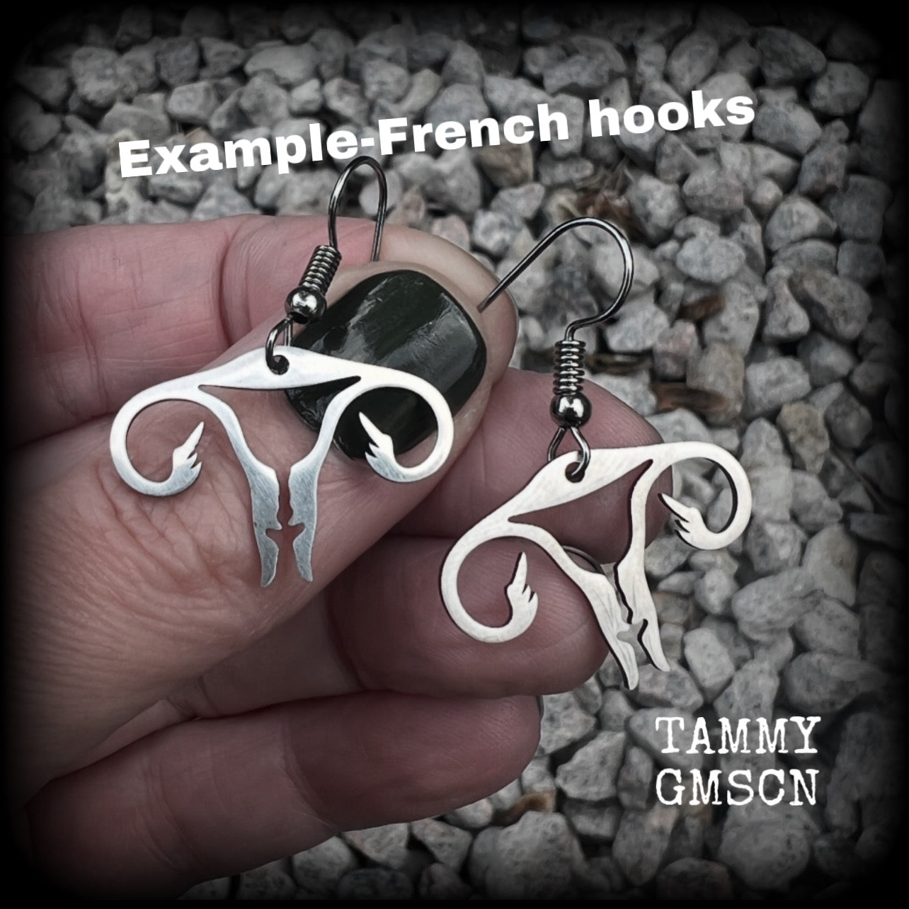 These amazing earrings feature offensive stainless steel female reproductive organs giving the middle finger! Nice and lightweight, weighing only a few grams each, these earrings measure approx 3.5cms from tip to tip.

This pair have been made on stainless steel french hooks, for pierced ears.