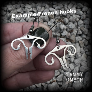 These amazing earrings feature offensive stainless steel female reproductive organs giving the middle finger! Nice and lightweight, weighing only a few grams each, these earrings measure approx 3.5cms from tip to tip.

This pair have been made on stainless steel french hooks, for pierced ears.