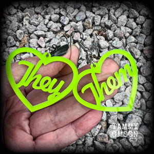 These earrings feature gorgeous bright neon green hearts showing the pronouns THEY/THEM. 
These are nice and lightweight (at only a few grams each), and measure approx 6.5cms from tip to tip.

This pair have been made on stainless steel french hooks, for pierced ears.