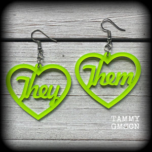 These earrings feature gorgeous bright neon green hearts showing the pronouns THEY/THEM. 
These are nice and lightweight (at only a few grams each), and measure approx 6.5cms from tip to tip.

This pair have been made on stainless steel french hooks, for pierced ears.