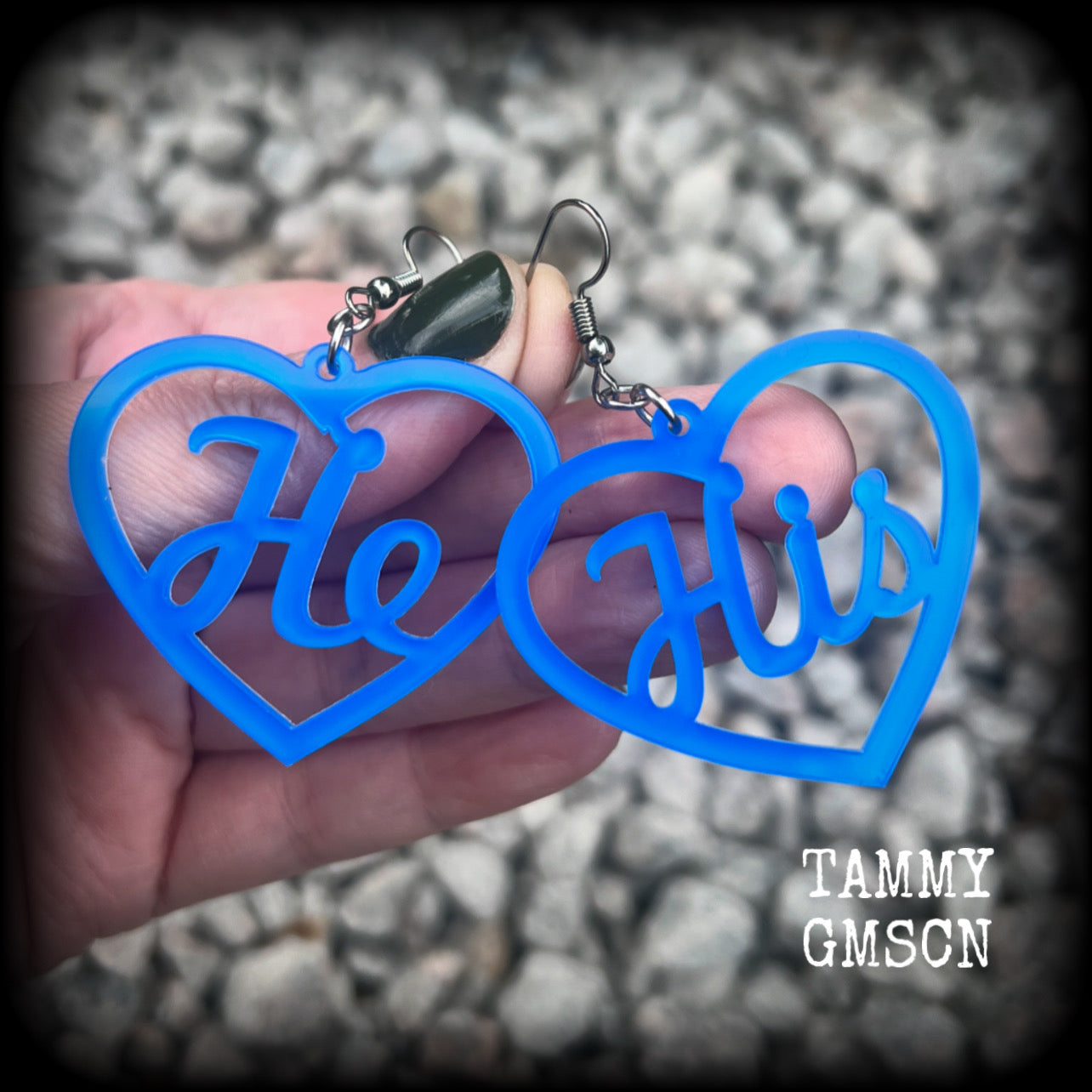 These awesome earrings feature gorgeous bright neon blue hearts showing the pronouns HE/HIS. 
These are nice and lightweight (at only a few grams each), and measure approx 6.5cms from tip to tip.

This pair have been made on stainless steel french hooks, for pierced ears.