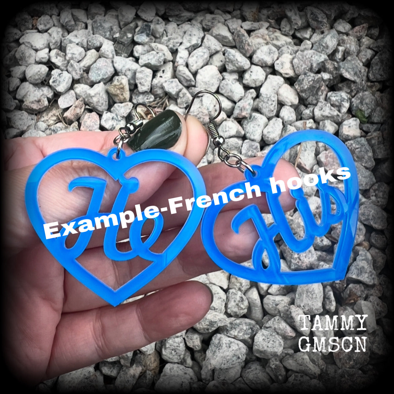 These awesome earrings feature gorgeous bright neon blue hearts showing the pronouns HE/HIS. 
These are nice and lightweight (at only a few grams each), and measure approx 6.5cms from tip to tip.

This pair have been made on stainless steel french hooks, for pierced ears.