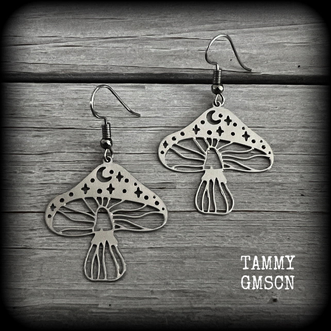 These adorable celestial stainless steel mushroom earrings measure in at just on 5cms from tip to tip, and are nice and light weighing only a few grams each.

This pair has been made with stainless steel french hooks, for pierced ears.