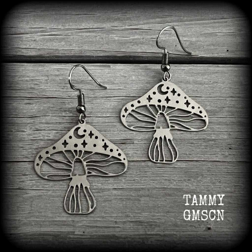 These adorable celestial stainless steel mushroom earrings measure in at just on 5cms from tip to tip, and are nice and light weighing only a few grams each.

This pair has been made with stainless steel french hooks, for pierced ears.