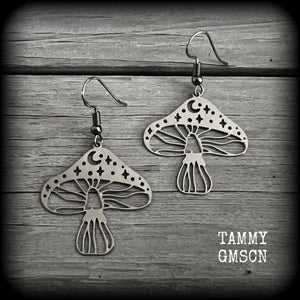These adorable celestial stainless steel mushroom earrings measure in at just on 5cms from tip to tip, and are nice and light weighing only a few grams each.

This pair has been made with stainless steel french hooks, for pierced ears.