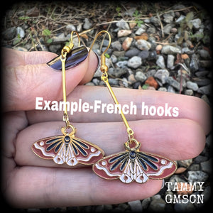 These cute little burnt orange and beige antique gold and enamel butterfly earrings measure in at just on 5.5cms from tip to tip, are nice and light weighing only a few grams each, made with antique gold french hooks, suitable for pierced ears.
