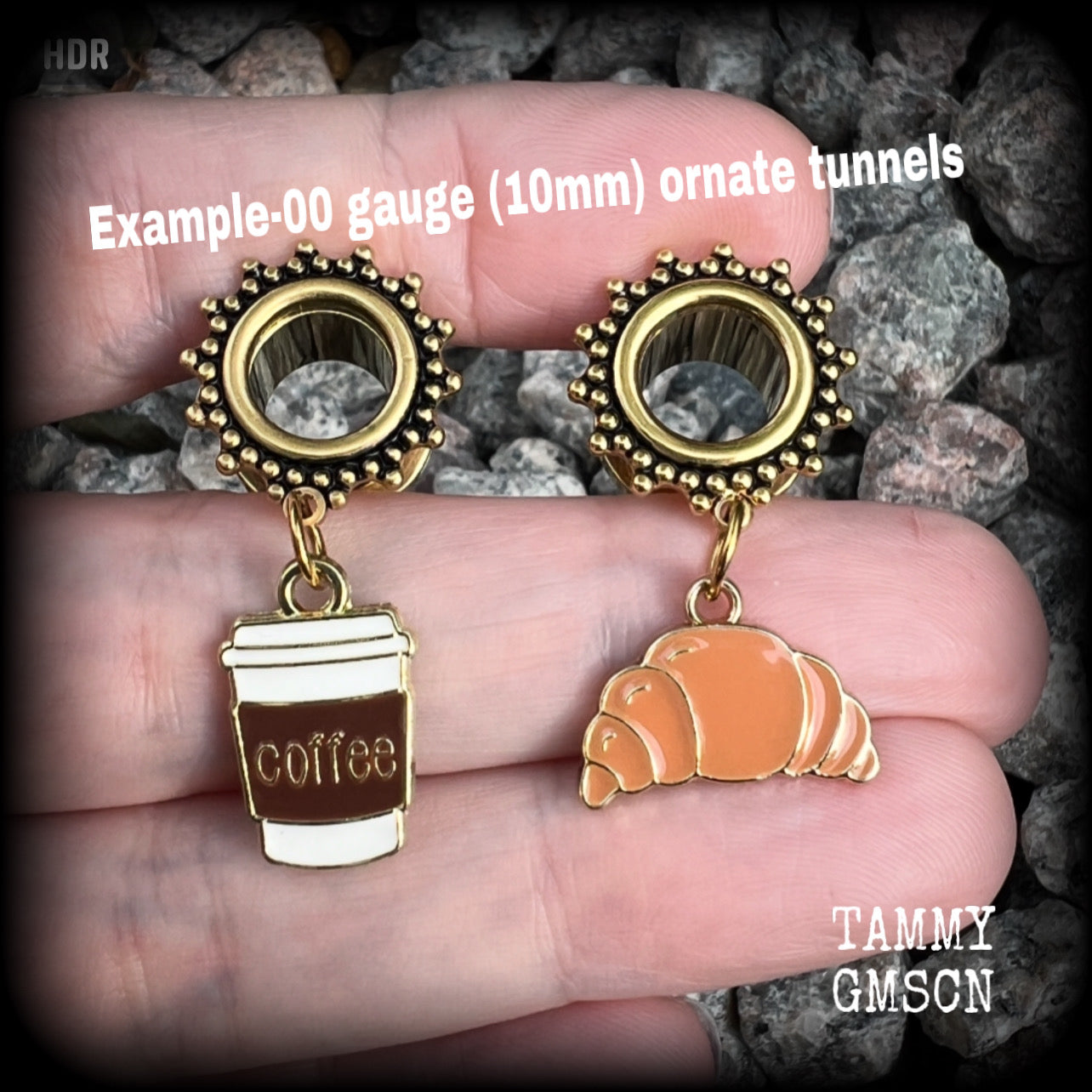 These adorable tunnel earrings feature a cup of coffee and a cute croissant, weighing approx 5 grams each, and measuring just under 4cms from tip to tip.

This pair has been made with 00 gauge (10mm) surgical steel ornate screw fit tunnels-suitable for pierced ears.