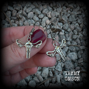 These adorable earrings feature cute little antique silver female reproductive organs! Nice and lightweight, weighing only a few grams each, these earrings measure approx 3cms from tip to tip.

This pair have been made on stainless steel french hooks, for pierced ears.
