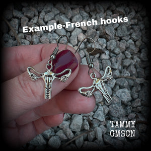 These adorable earrings feature cute little antique silver female reproductive organs! Nice and lightweight, weighing only a few grams each, these earrings measure approx 3cms from tip to tip.

This pair have been made on stainless steel french hooks, for pierced ears.