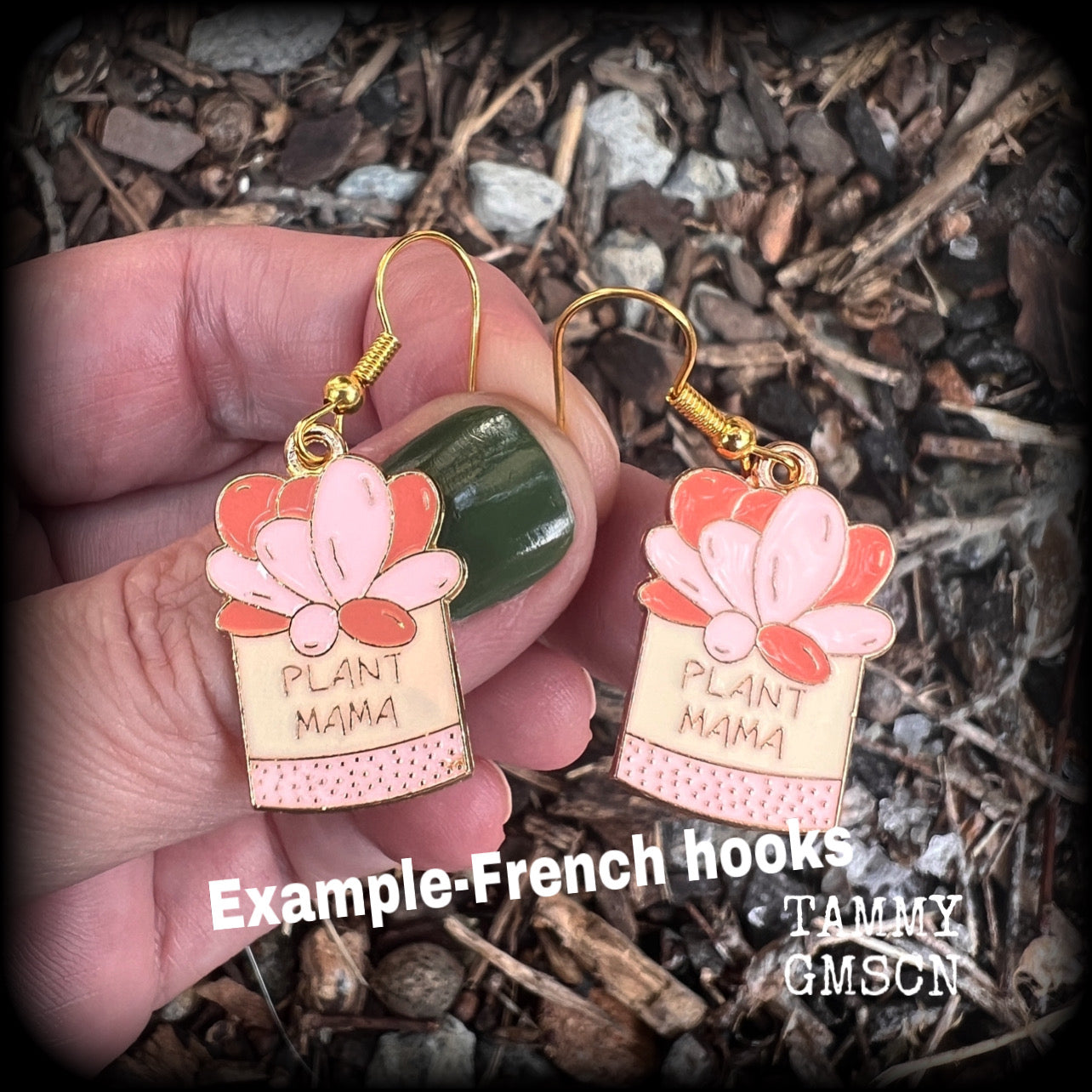 These quirky earrings feature an antique gold and enamel potted ‘PLANT MAMA’ plant, measuring just on 5cms from top to bottom, and weighing only a few grams each.
This pair has been made on antique gold french hooks, suitable for pierced ears.