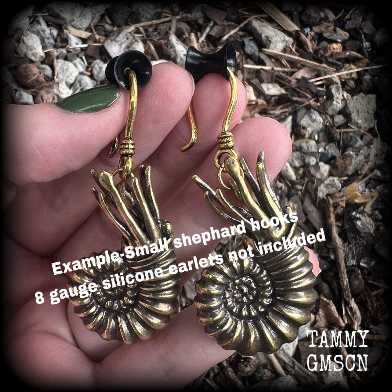 These gorgeous brass nautilus earrings weigh approx. 24 grams each and measure just over 6cms from tip to tip.
This pair have been made with small antique gold shephard hooks, suitable for stretched ears.