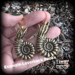These gorgeous brass nautilus earrings weigh approx. 24 grams each and measure just over 6cms from tip to tip.
This pair have been made with antique gold leverback hooks, suitable for pierced ears.