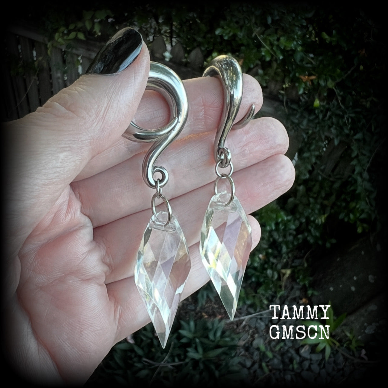 These gorgeous dangly earrings have been made with gorgeous faceted faux glass pieces, measuring just on 8 cms from tip to tip, and weighing approx 18 grams each.

These earrings have been made on 0 gauge (8mm) surgical steel full curls, to be worn in stretched lobes.