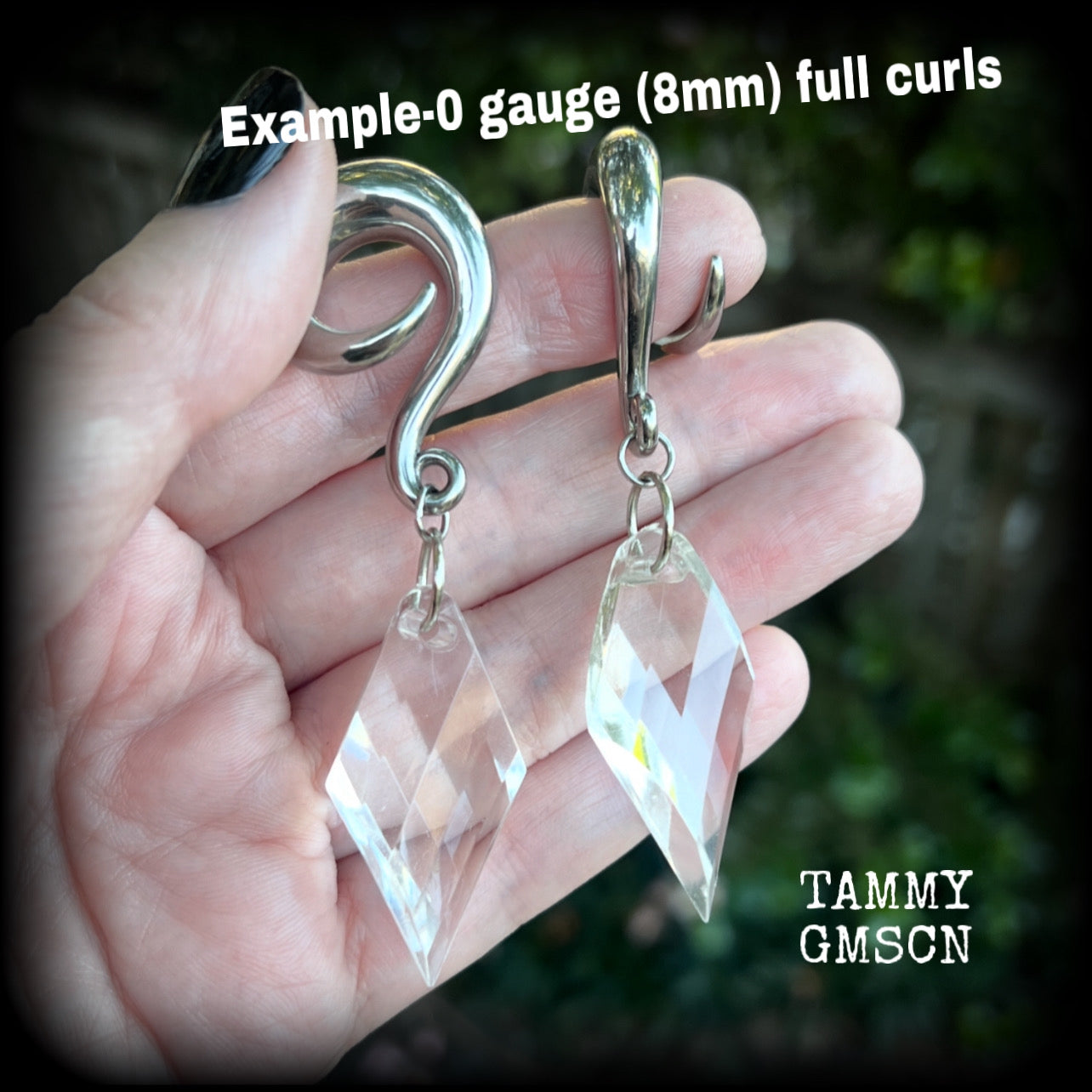 These gorgeous dangly earrings have been made with gorgeous faceted faux glass pieces, measuring just on 8 cms from tip to tip, and weighing approx 18 grams each.

These earrings have been made on 0 gauge (8mm) surgical steel full curls, to be worn in stretched lobes.