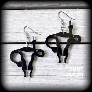 Angry uterus earrings 