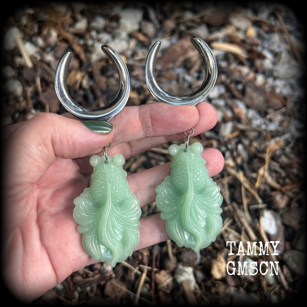 These gorgeous earrings feature carved chinese jade koi fish, weighing approx. 34 grams each and measuring just over 10cms from tip to tip.
This pair have been made on 1.18” gauge (30mm) surgical steel cradles, suitable for stretched lobes.