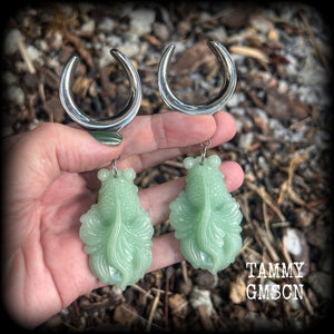 These gorgeous earrings feature carved chinese jade koi fish, weighing approx. 34 grams each and measuring just over 10cms from tip to tip.
This pair have been made on 1.18” gauge (30mm) surgical steel cradles, suitable for stretched lobes.