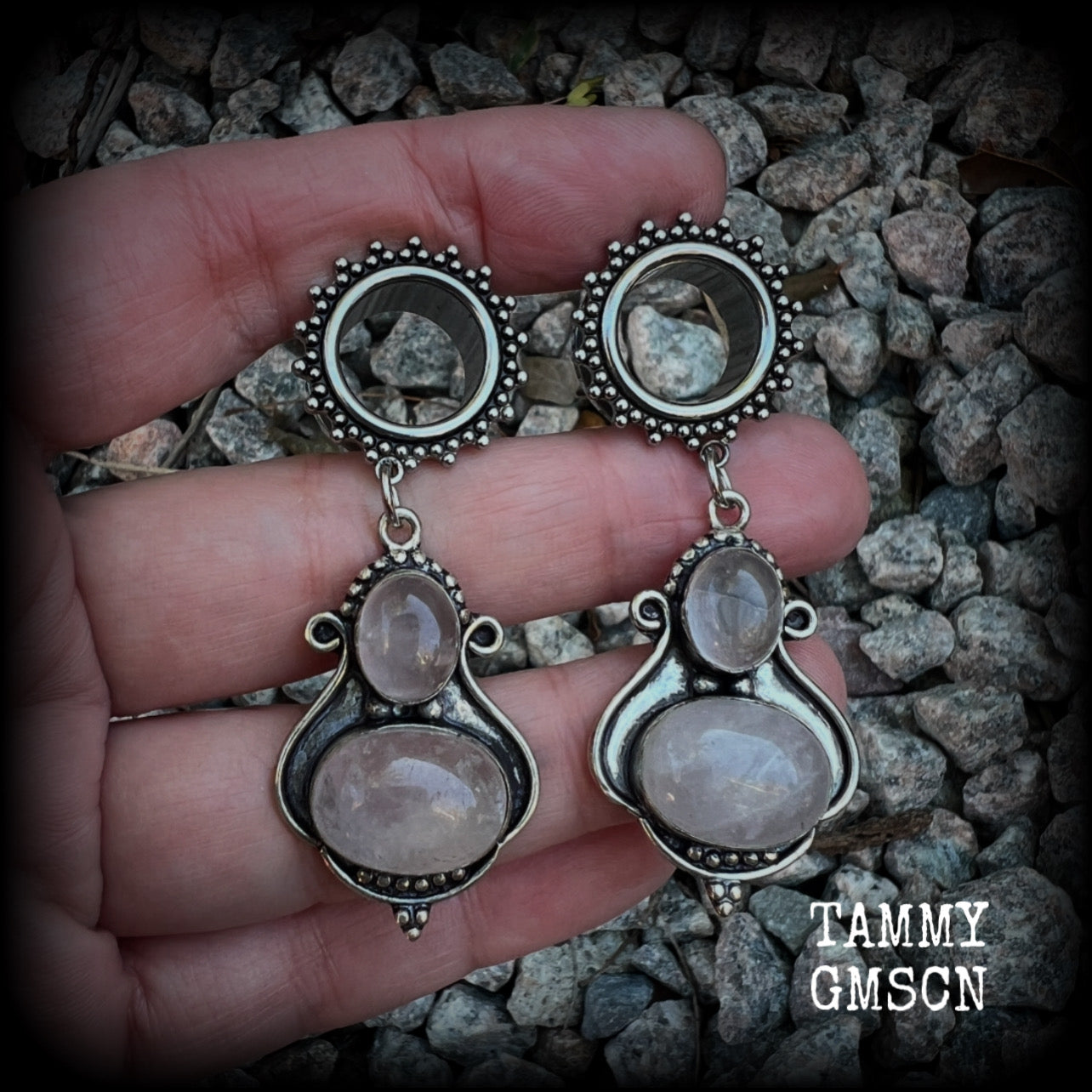 These beautiful earrings have been made with gorgeous translucent dusty pink rose quartz gemstones in a beautiful big boho antique silver setting, weighing approx 12 grams each and measure just over 6cms from tip to tip.

This pair has been made with 9/16" gauge (14mm) gauge ornate surgical steel screw fit tunnels.