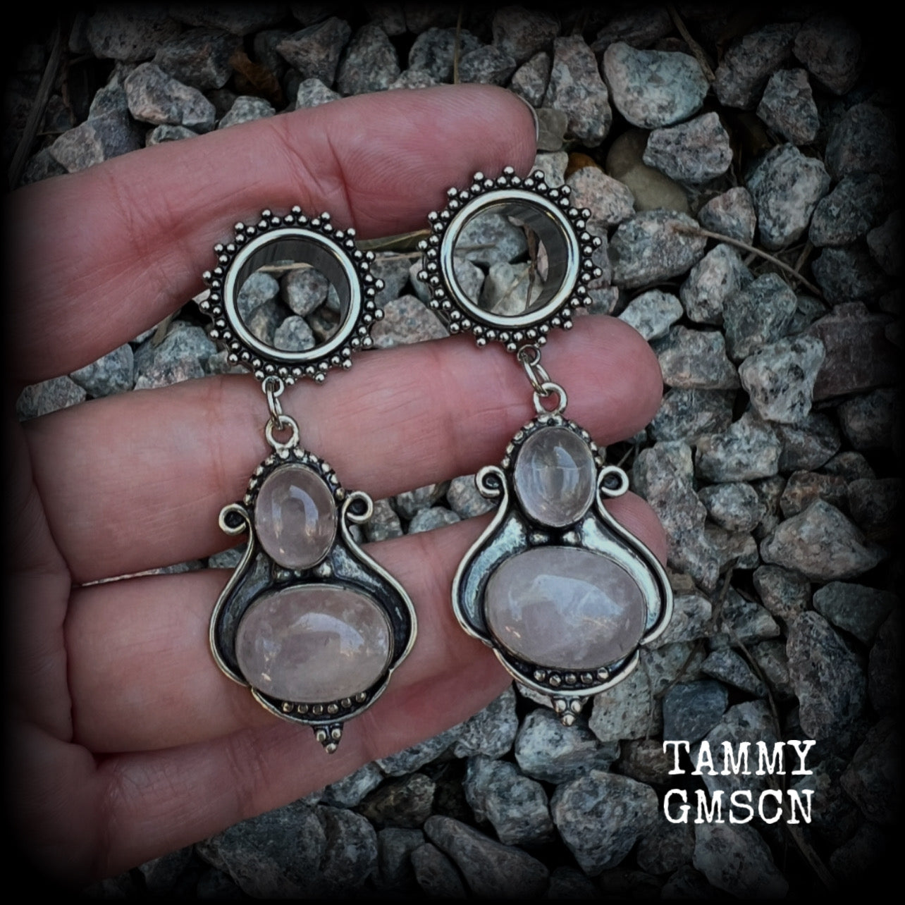These beautiful earrings have been made with gorgeous translucent dusty pink rose quartz gemstones in a beautiful big boho antique silver setting, weighing approx 12 grams each and measure just over 6cms from tip to tip.

This pair has been made with 9/16" gauge (14mm) gauge ornate surgical steel screw fit tunnels.