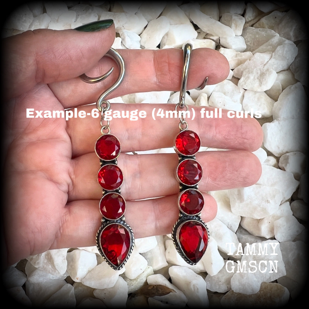 These stunning dangly gauged earrings feature gorgeous deep red faceted garnet gemstones in an ornate antique silver setting, measuring just over 8cms from tip to tip, and weigh approx 9 grams each.

This pair have been made with 6 gauge (4mm) surgical steel full curl hooks, to be worn in stretched lobes.