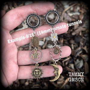 These super witchy super dangly boho tunnel earrings feature gorgeous bronze and antique silver sun and moon charms, measuring 9 cms from tip to tip and weighing approx 11 grams each.
This pair has been have been made on 9/16” (14mm) gauge ornate surgical steel screw fit tunnels, suitable for stretched lobes.
